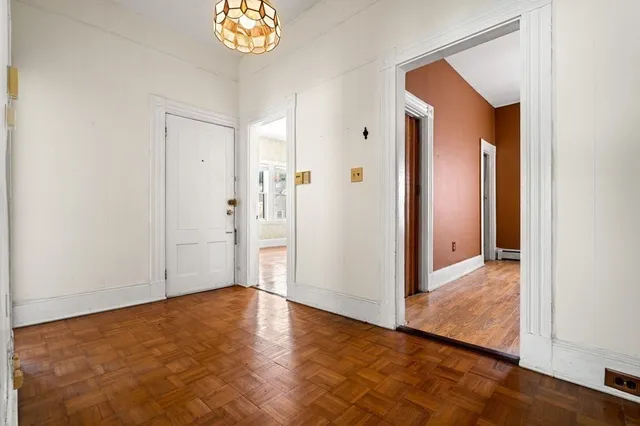 a view of a hallway with entryway