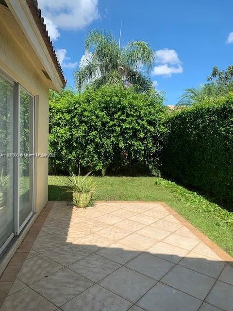 Savanna Weston, FL 33327 - Photo 16 of 24 a view of a yard with potted plants