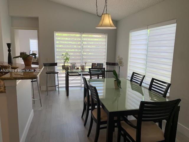 Savanna Weston, FL 33327 - Photo 5 of 24 a view of a dining room with furniture window and outside view