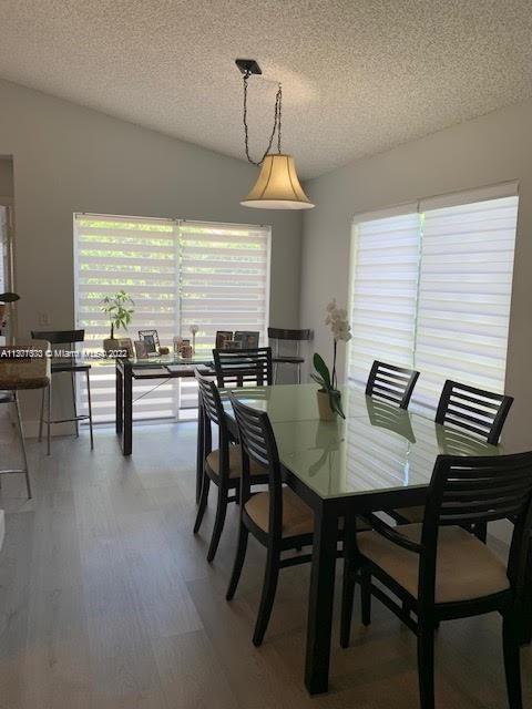 Savanna Weston, FL 33327 - Photo 6 of 24 a view of a dining room with furniture window and outside view