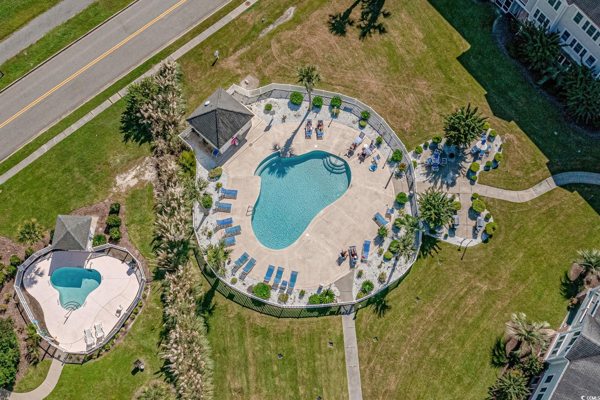4815 Orchid Way, Unit 302 Myrtle Beach, SC 29577 - Photo 25 of 26 Bird's eye view of a pool