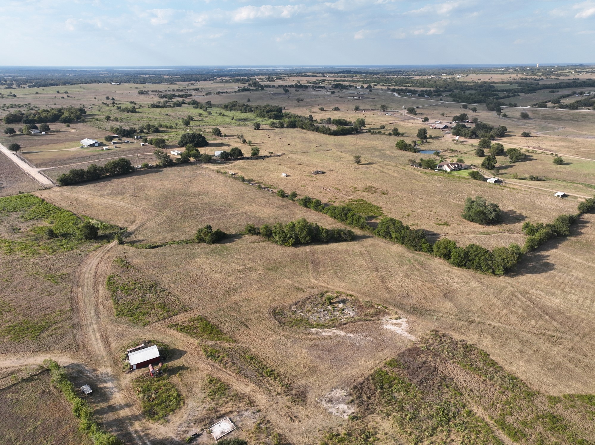 44-acres Ganske Road Burton, TX 77835 - Photo 30 of 42 an aerial view of residential houses with outdoor space