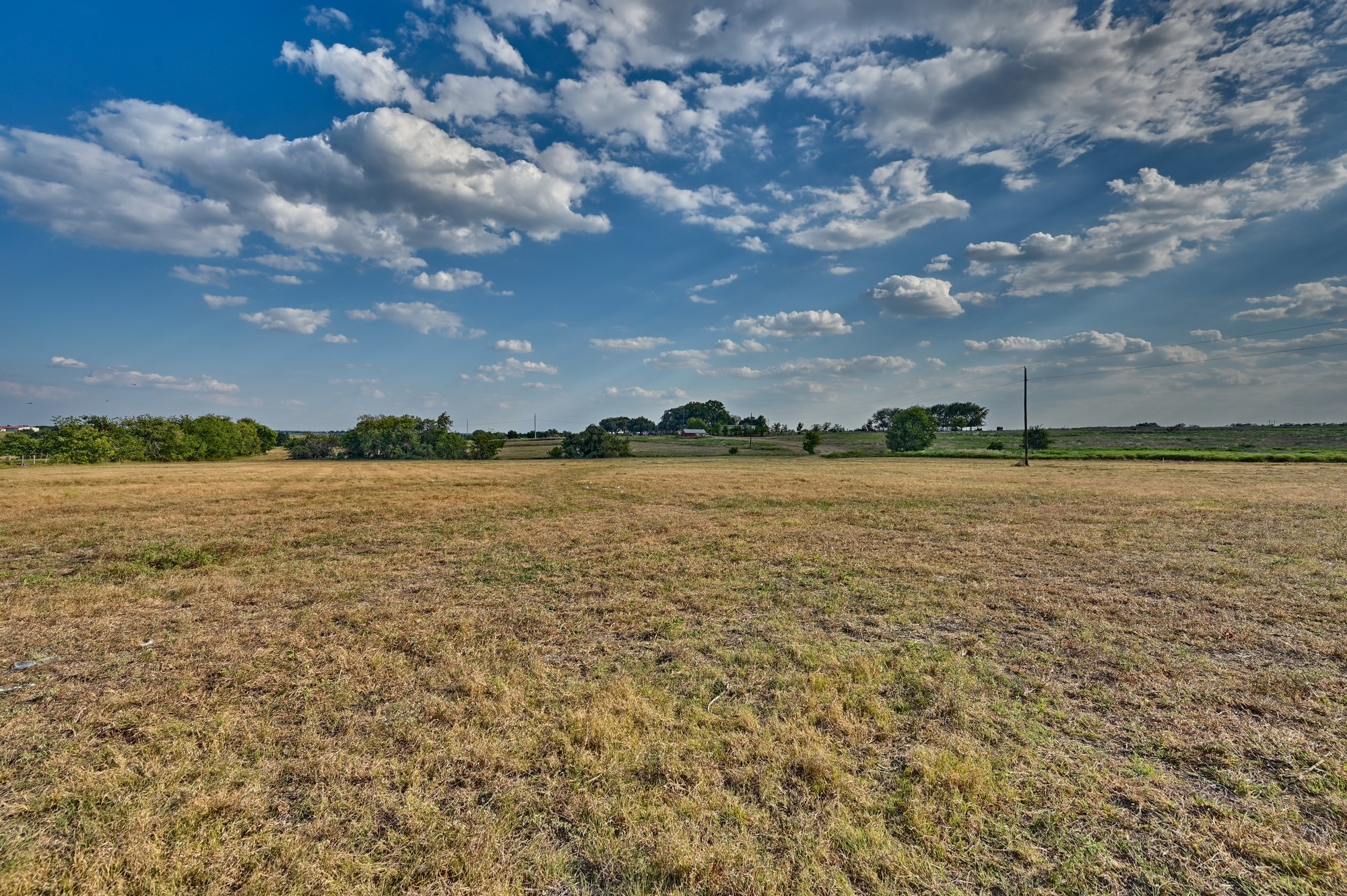 44-acres Ganske Road Burton, TX 77835 - Photo 34 of 42 a view of a lake with houses in the back