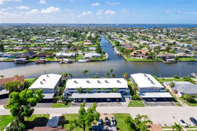 an aerial view of a house with a garden