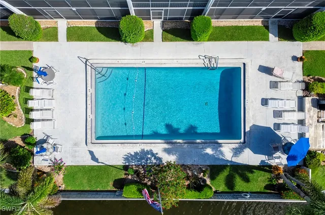 a view of a lake with a house in the background