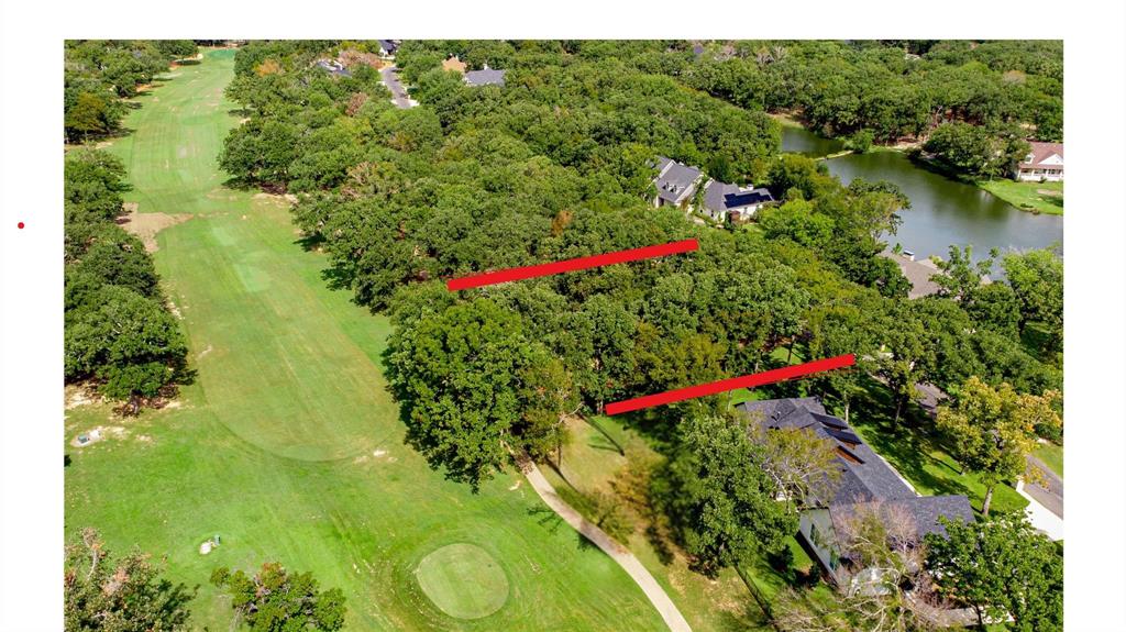227 Colonial Drive Mabank, TX 75156 - Photo 3 of 23 a view of a flower garden with a lake and trees