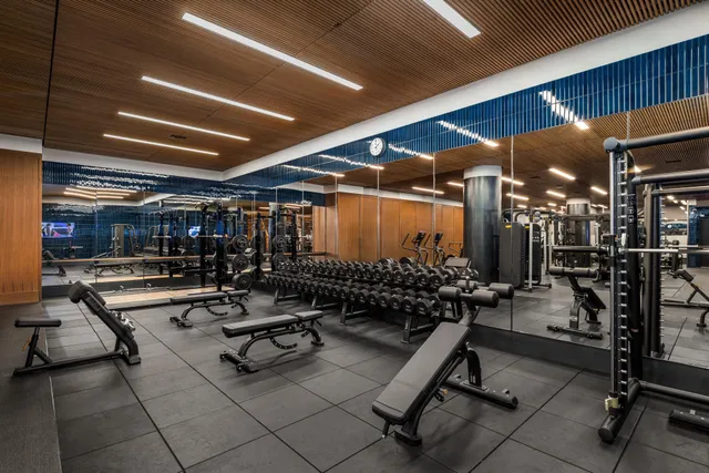 an empty room with wooden floor