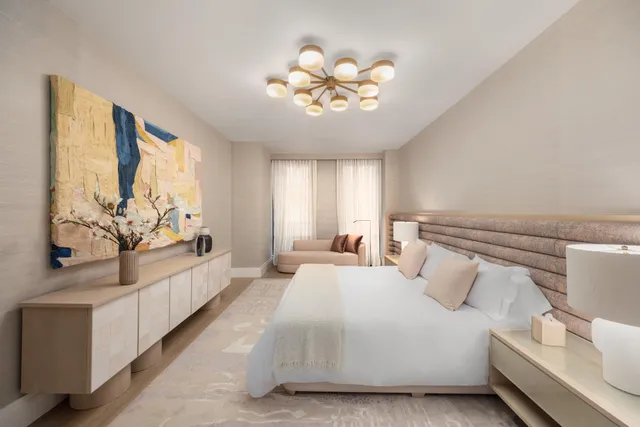 a kitchen with a stove a refrigerator a sink and chairs