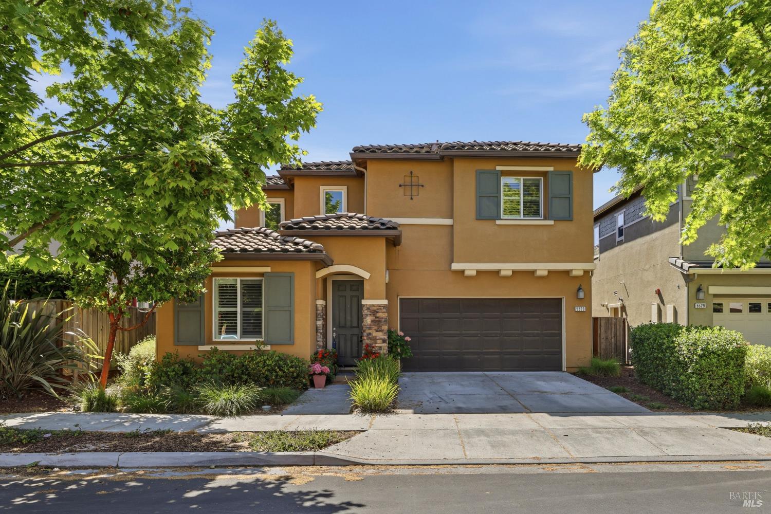 5533 Kennedy Place Rohnert Park, CA 94928 - Photo 39 of 63 a front view of a house with a yard