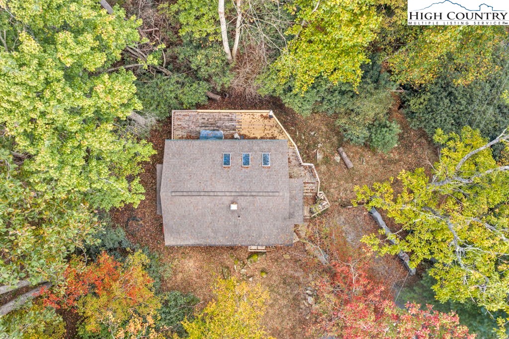 180 Wild Blackberry Hill Road Boone, NC 28607 - Photo 27 of 30 front view of a house with a yard