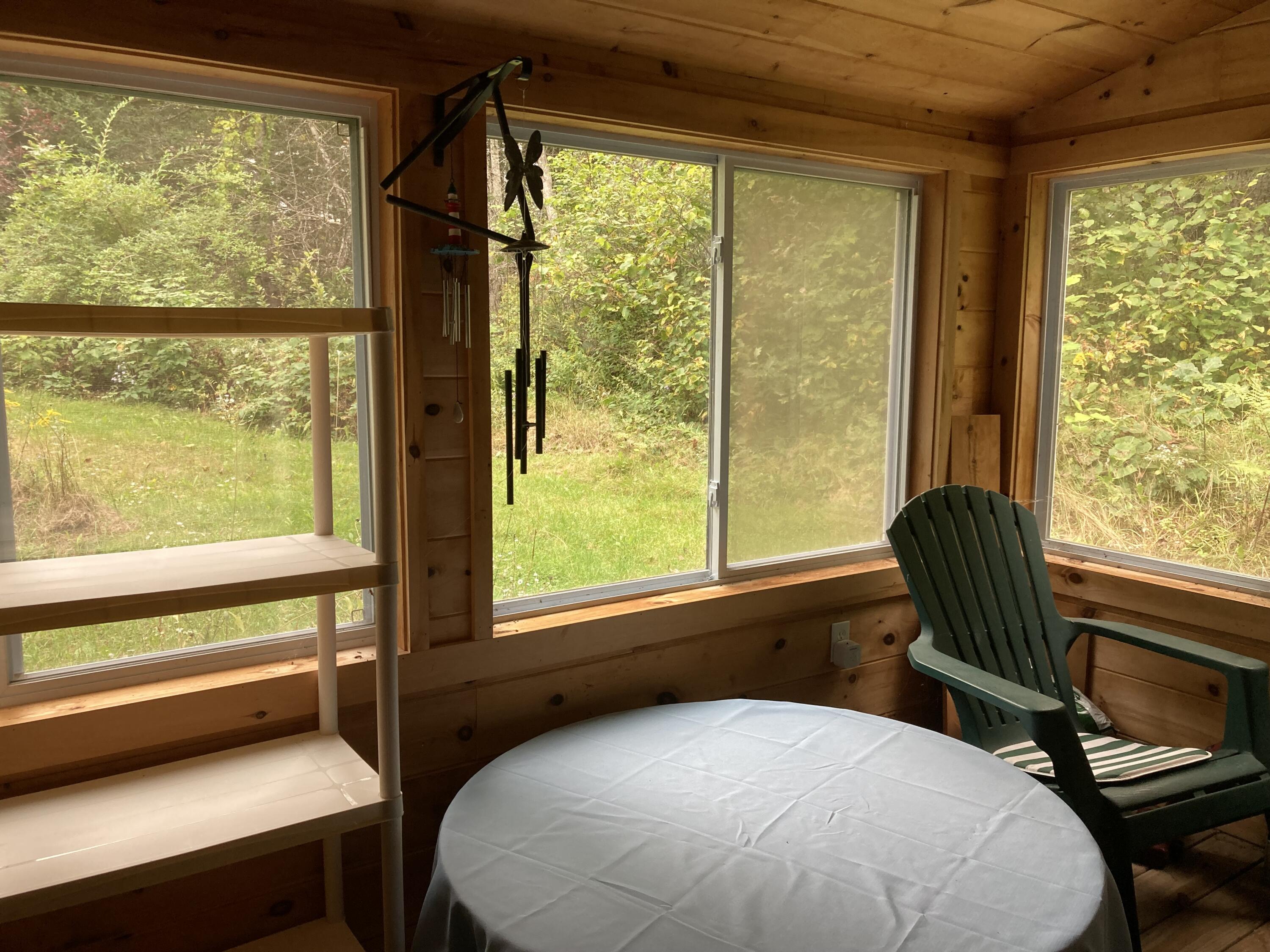 23 South Bay Road Franklin, ME 04634 - Photo 18 of 22 Glassed-in porch.