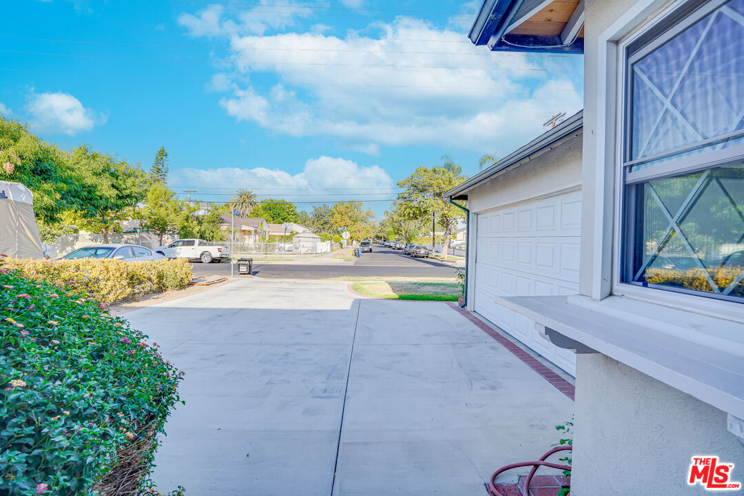 6919 Vanalden Avenue Reseda, CA 91335 - Photo 3 of 10 a view of yard along with trees