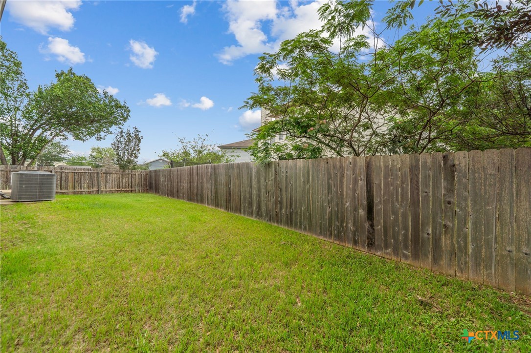 109 Comal Cove Elgin, TX 78621 - Photo 34 of 34 a view of outdoor space and yard