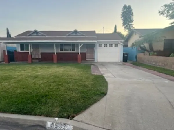a view of a house with a garden