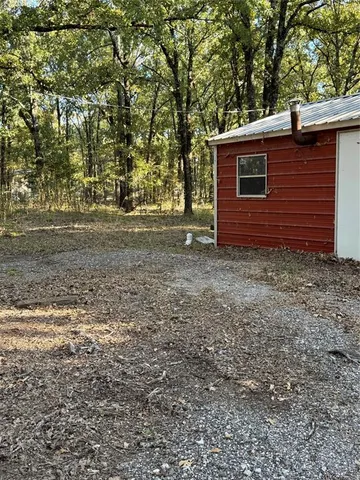 a view of workspace with furniture and window
