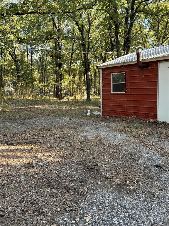 6171 Glen Oaks Road Mabank, TX 75156 - Photo 12 of 20 a view of a backyard