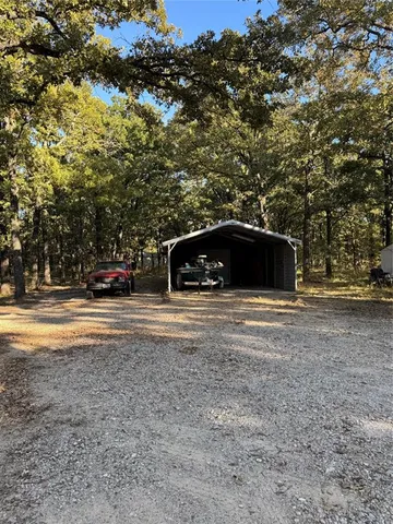 a view of street with parked cars