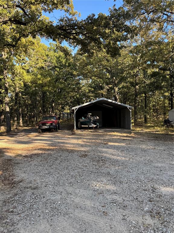 6171 Glen Oaks Road Mabank, TX 75156 - Photo 9 of 20 a view of street with parked cars
