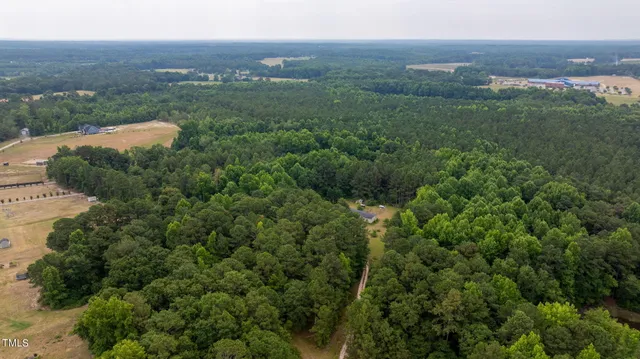 an aerial view of residential house with outdoor space
