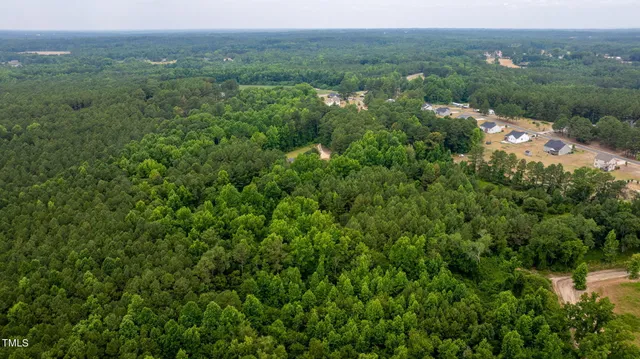 an aerial view of residential house with outdoor space