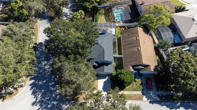an aerial view of houses with outdoor space