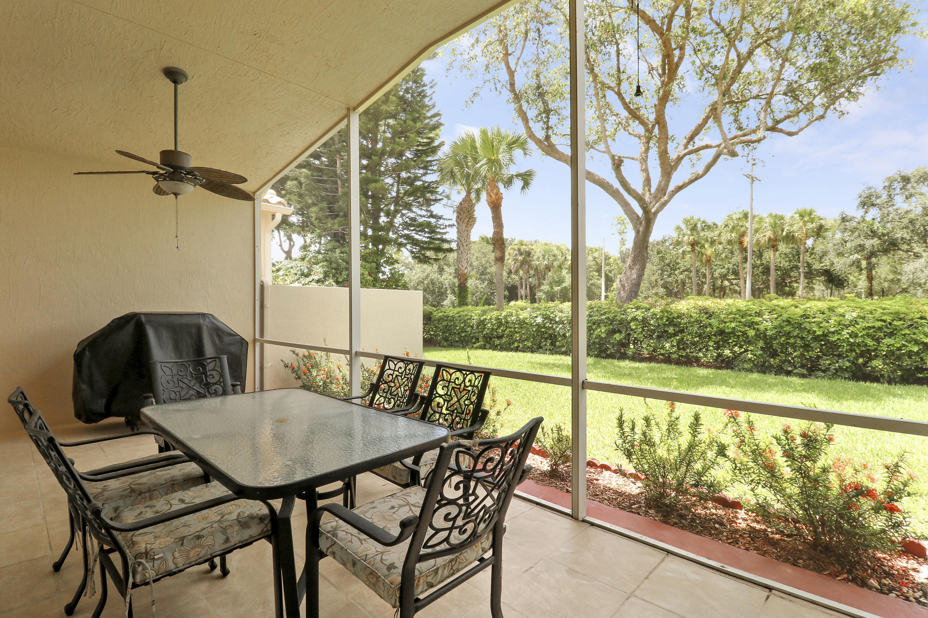 6565 Garde Road Boynton Beach, FL 33472 - Photo 19 of 54 Screened Porch Looking Onto Yard
