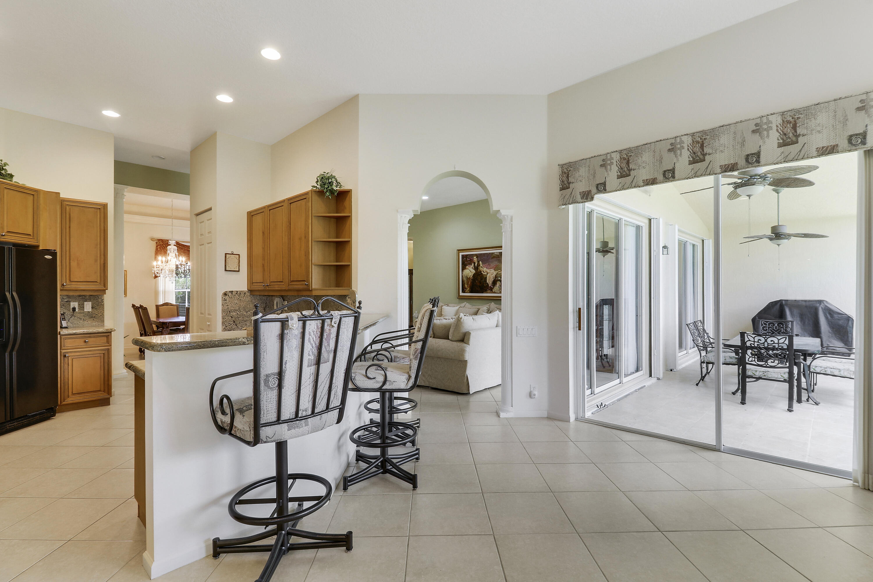 6565 Garde Road Boynton Beach, FL 33472 - Photo 24 of 54 Breakfast Bar Next to Screened Porch