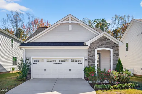 a view of a house with a garage