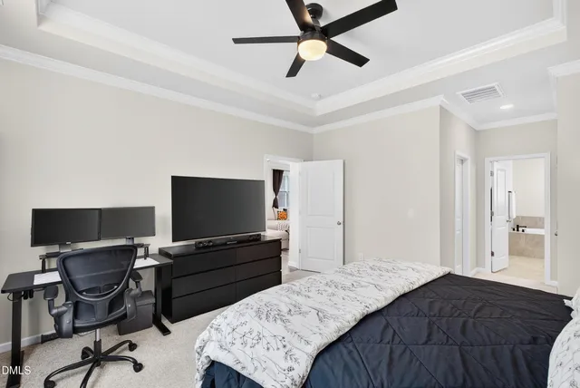 a bathroom with a sink double vanity granite tub shower and a mirror