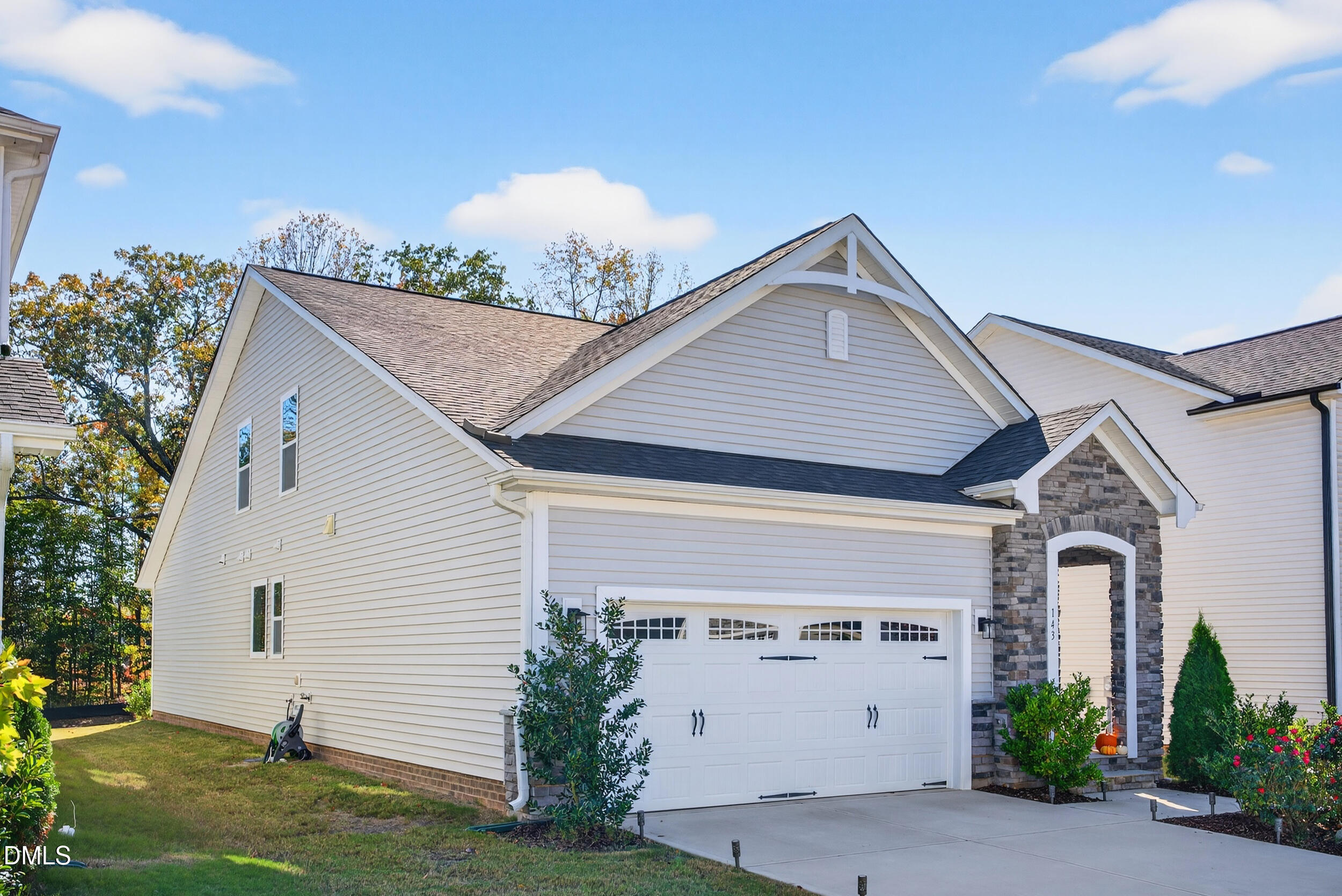 143 Umbrella Way Garner, NC 27529 - Photo 27 of 32 a aerial view of a house with a yard and potted plants