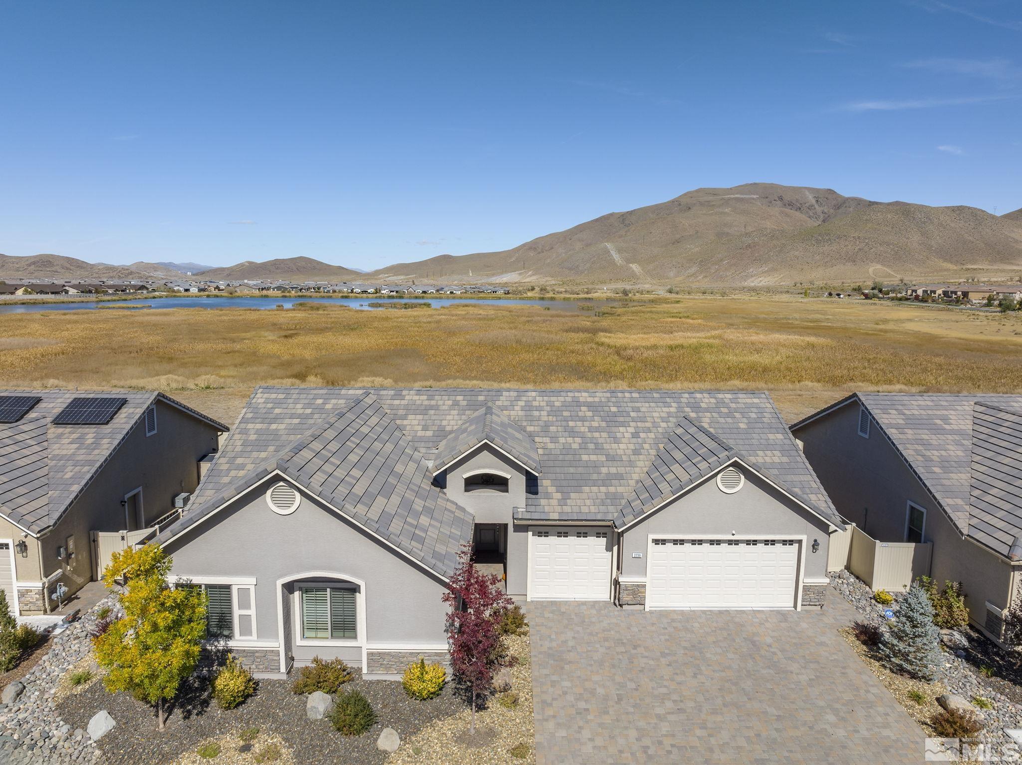 a view of a house with a lake view