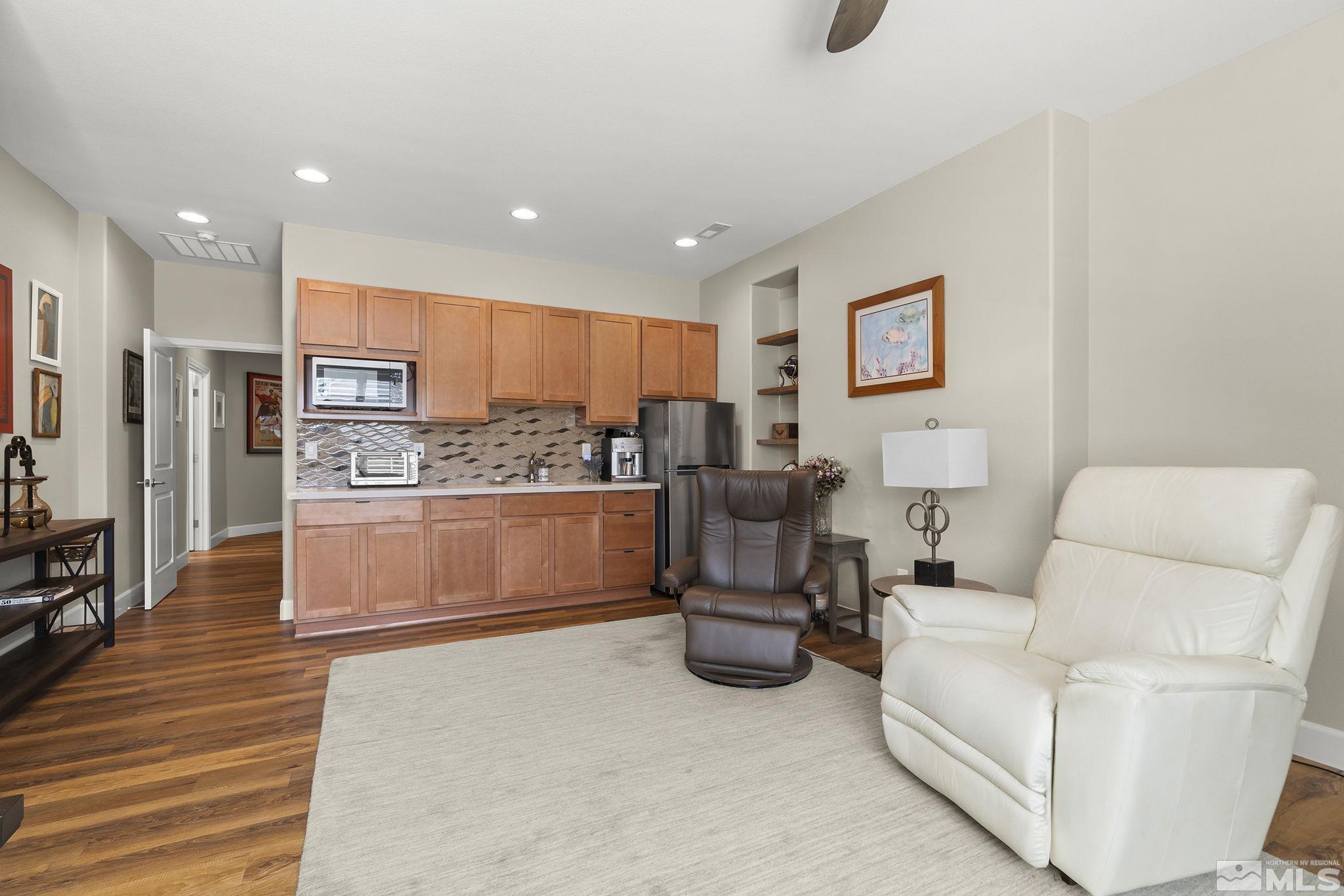 2239 Windflower Drive Reno, NV 89521 - Photo 24 of 40 a large room with a couch and a view of living room