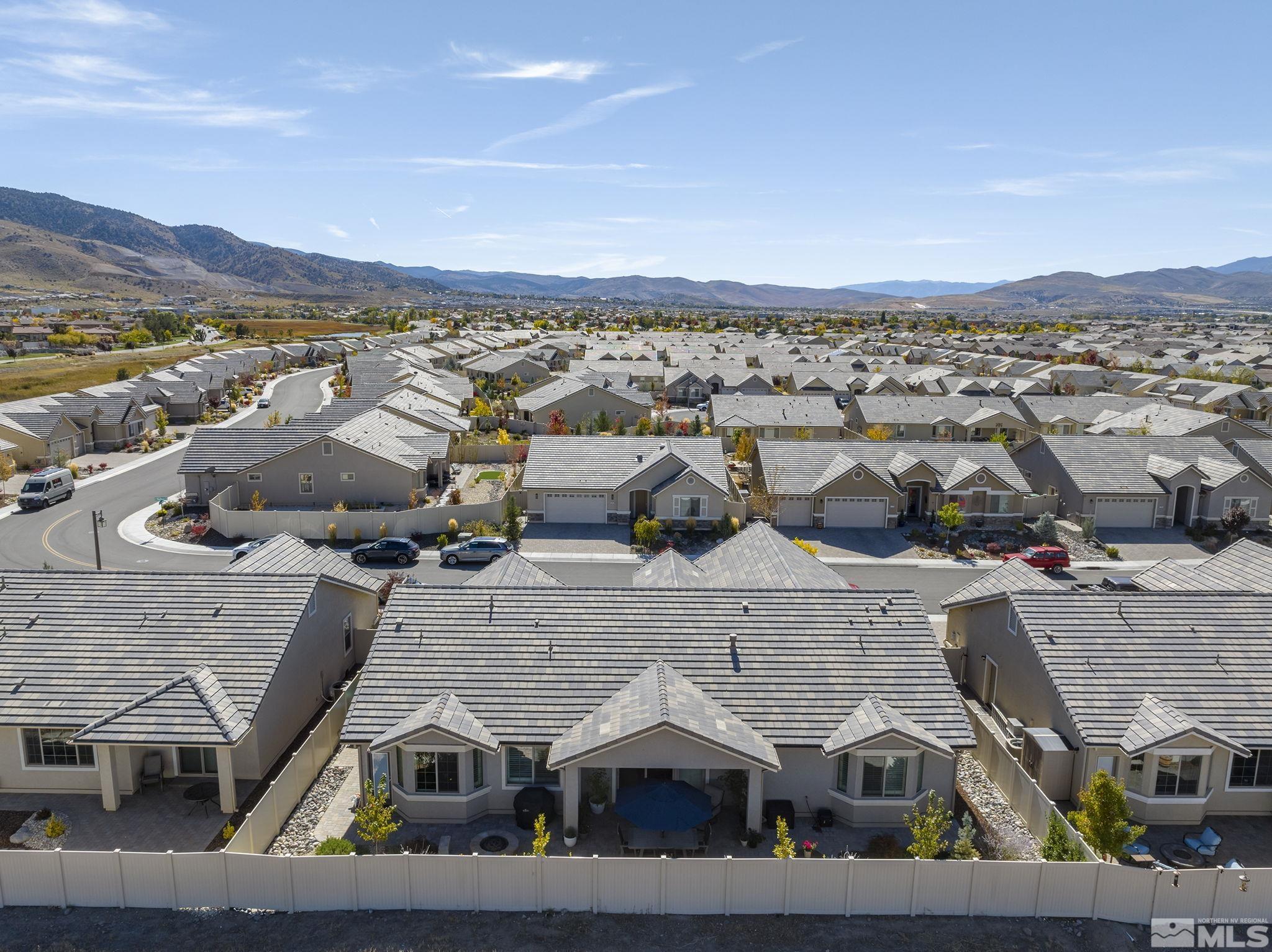 2239 Windflower Drive Reno, NV 89521 - Photo 33 of 40 a view of multiple houses with a city view