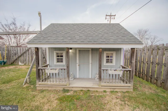 a front view of house with a porch