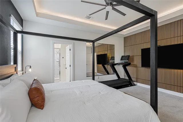 a bathroom with a double vanity sink mirror and shower