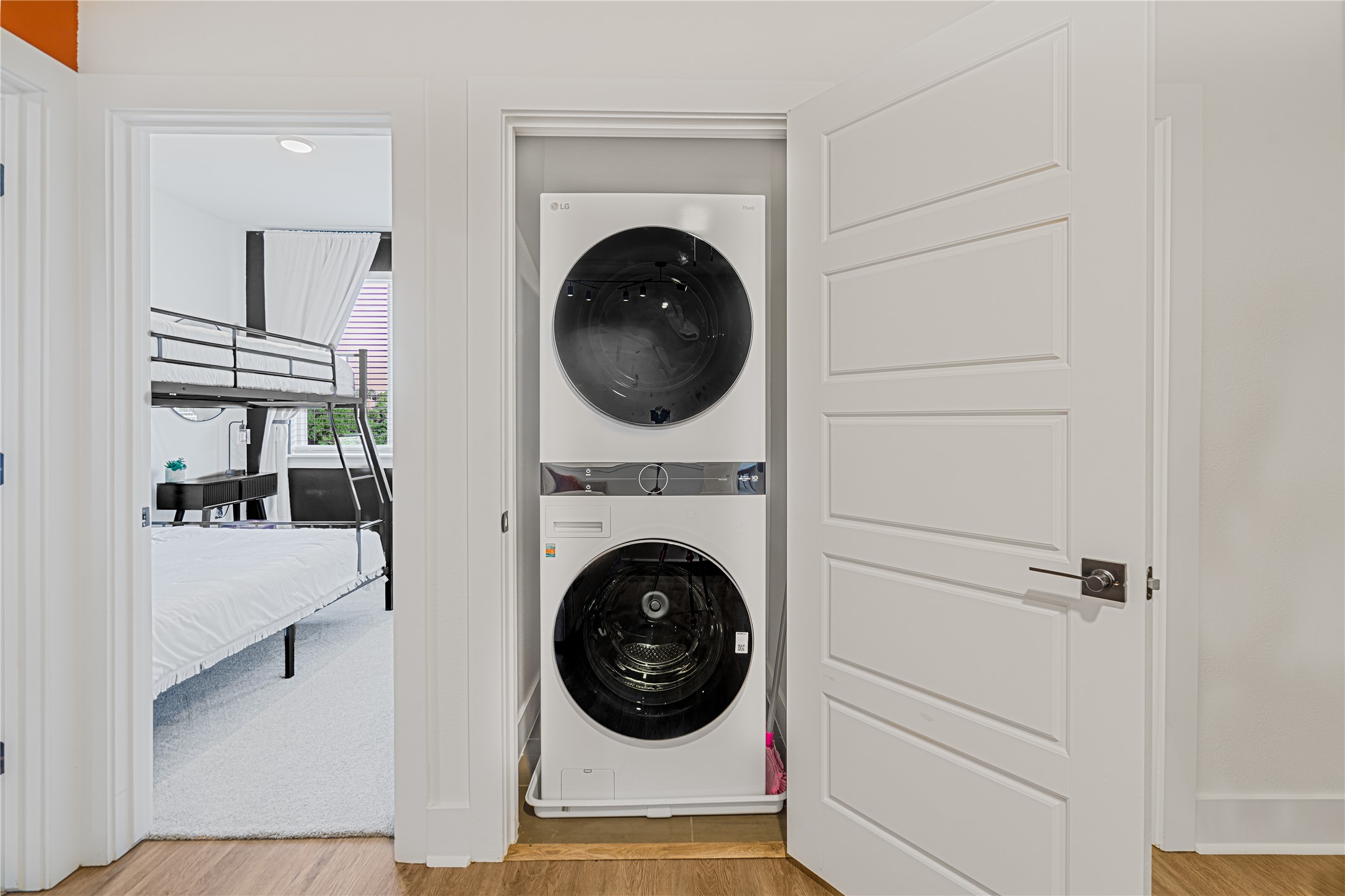 1811 Webberville Road, Unit 4103 Austin, TX 78721 - Photo 21 of 35 a view of a hallway with washer and dryer