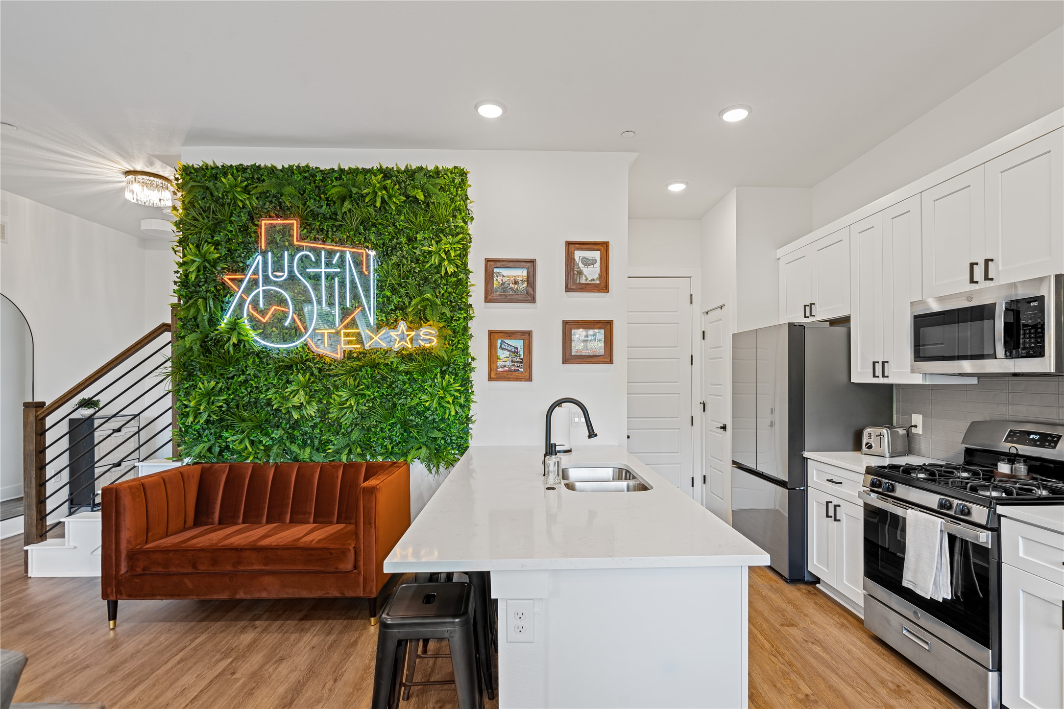 1811 Webberville Road, Unit 4103 Austin, TX 78721 - Photo 31 of 35 a kitchen with a sink appliances and cabinets
