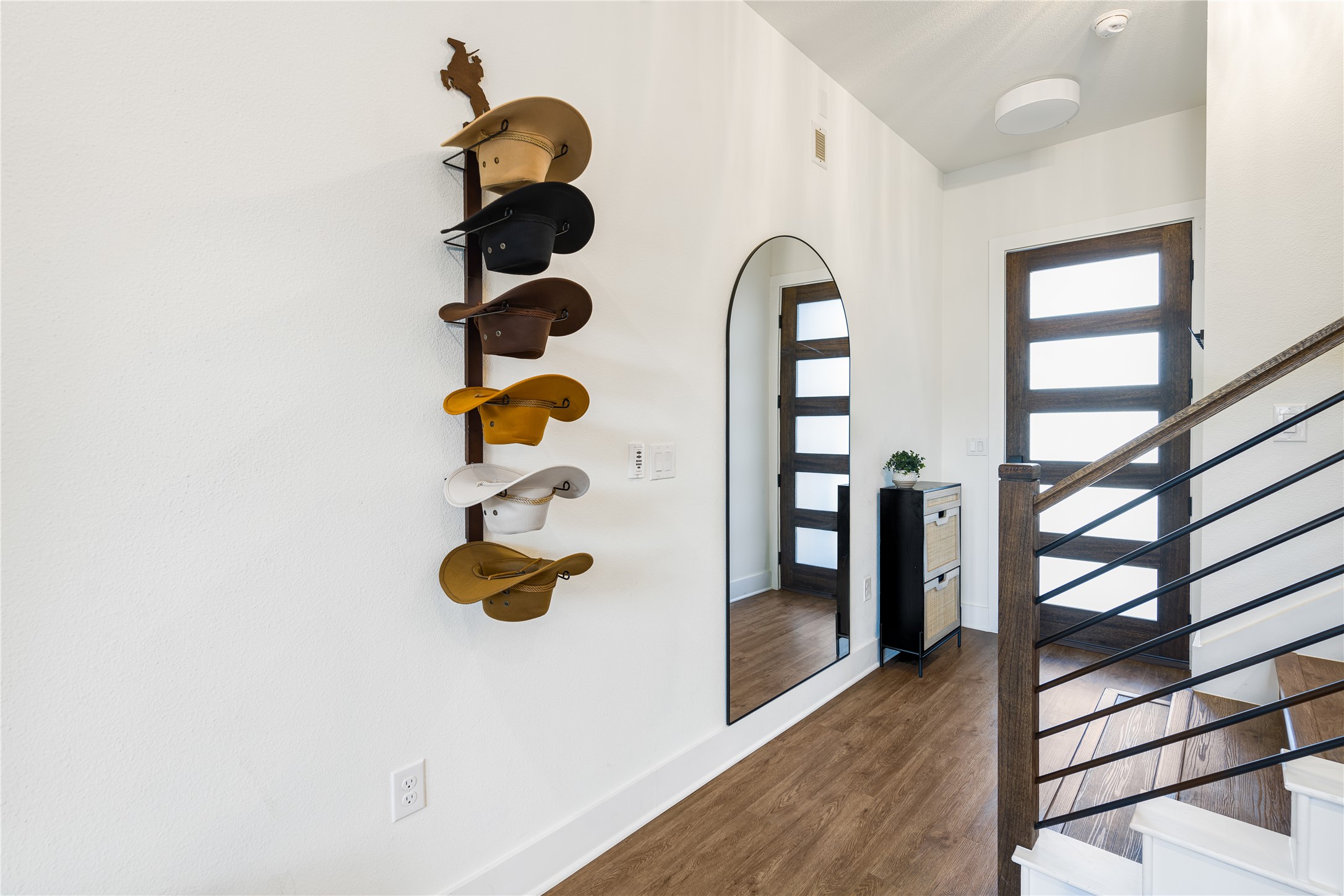 1811 Webberville Road, Unit 4103 Austin, TX 78721 - Photo 5 of 35 a picture of a room with wooden floor and windows