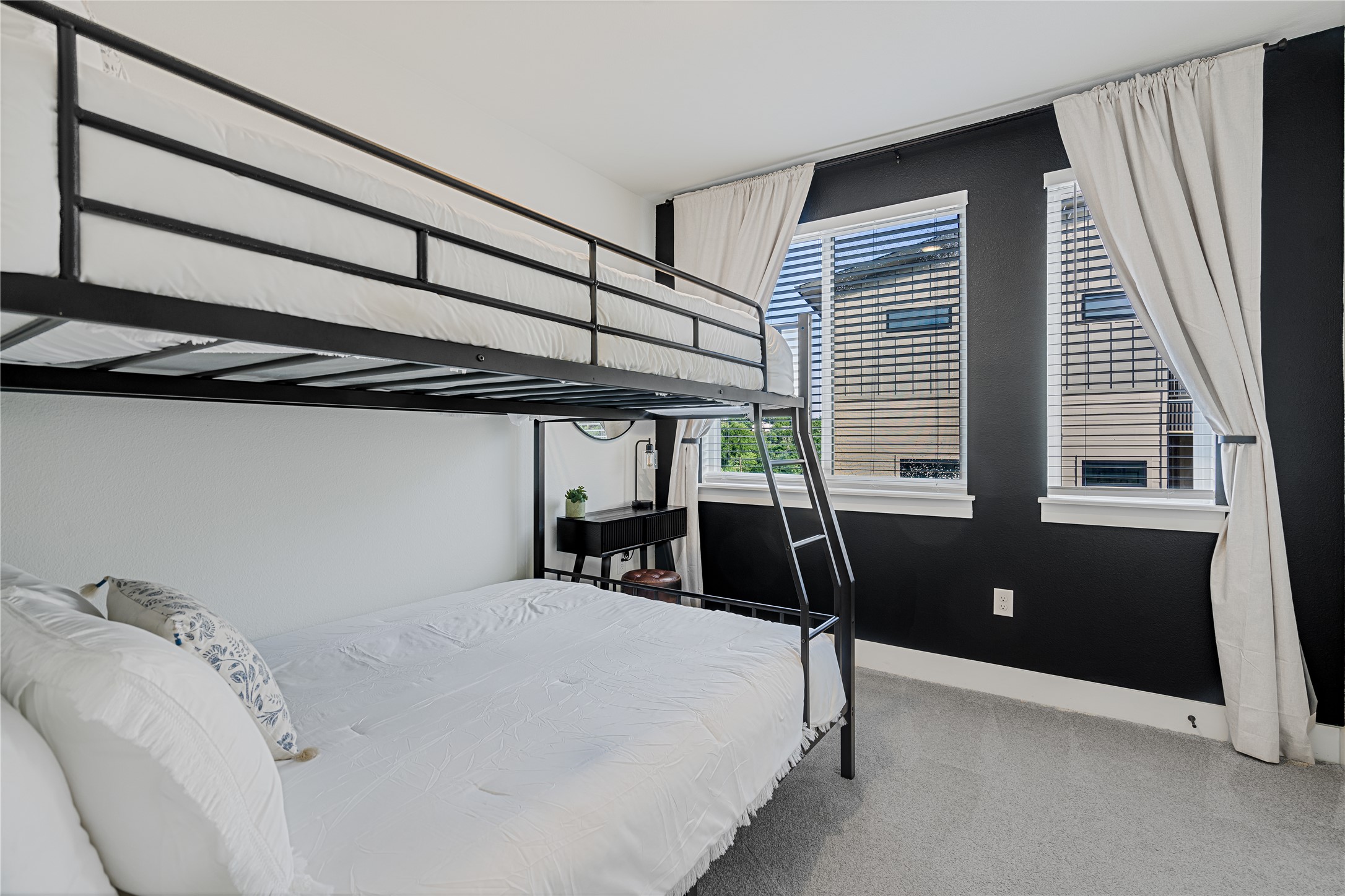 1811 Webberville Road, Unit 4103 Austin, TX 78721 - Photo 6 of 35 a bedroom with a bed and a window