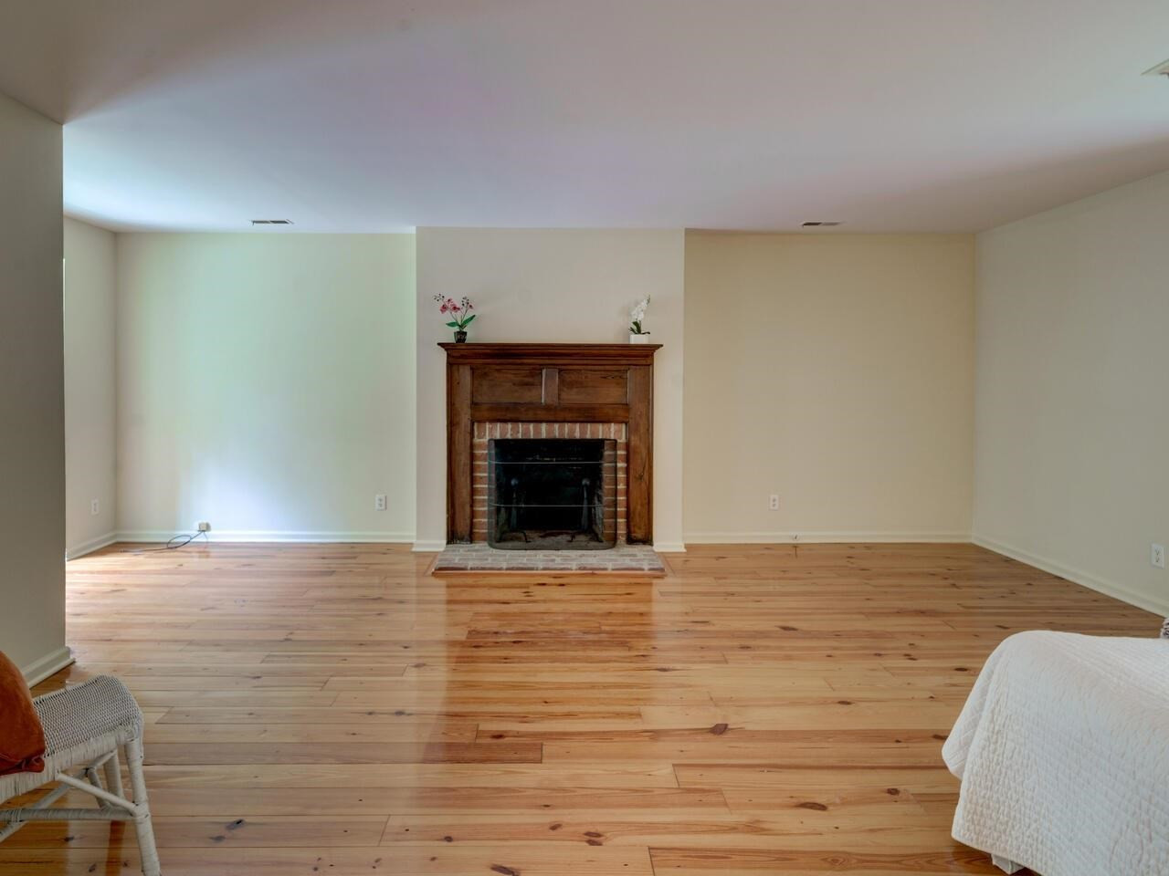 1100 Trail End Road Durham, NC 27712 - Photo 17 of 30 Primary bedroom fireplace