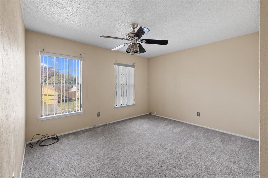 3708 Windsong Lane Bedford, TX 76021 - Photo 30 of 35 a view of an empty room with a window