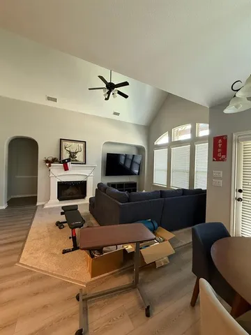 a living room with furniture and a window
