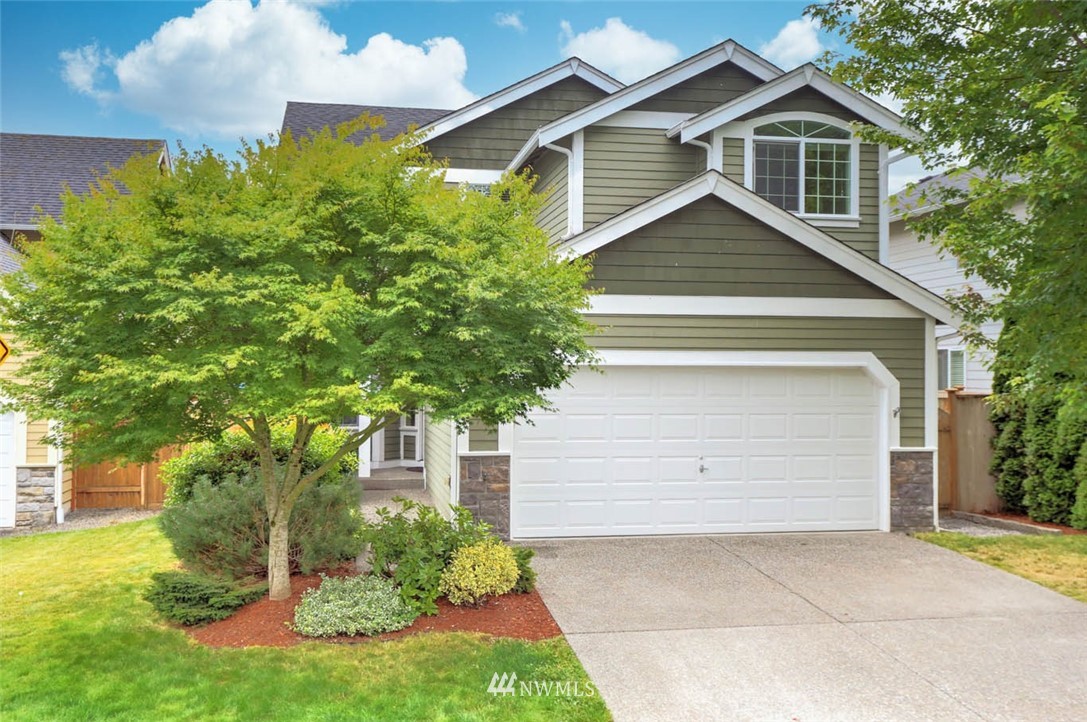 6731 Southeast 3rd Street Renton, WA 98059 - Photo 1 of 31 a view of a house with a yard