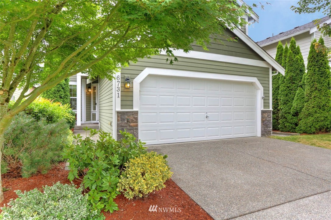 6731 Southeast 3rd Street Renton, WA 98059 - Photo 2 of 31 front view of a house with a street