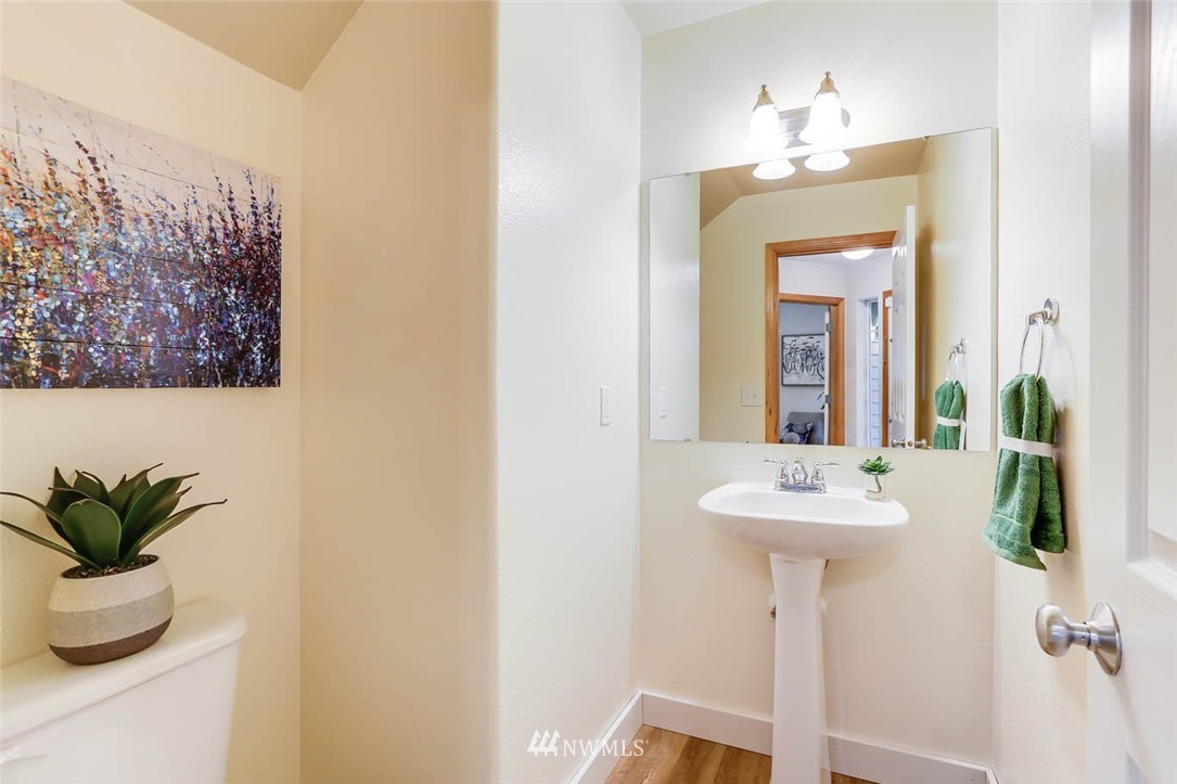 6731 Southeast 3rd Street Renton, WA 98059 - Photo 14 of 31 a bathroom with a sink and a mirror