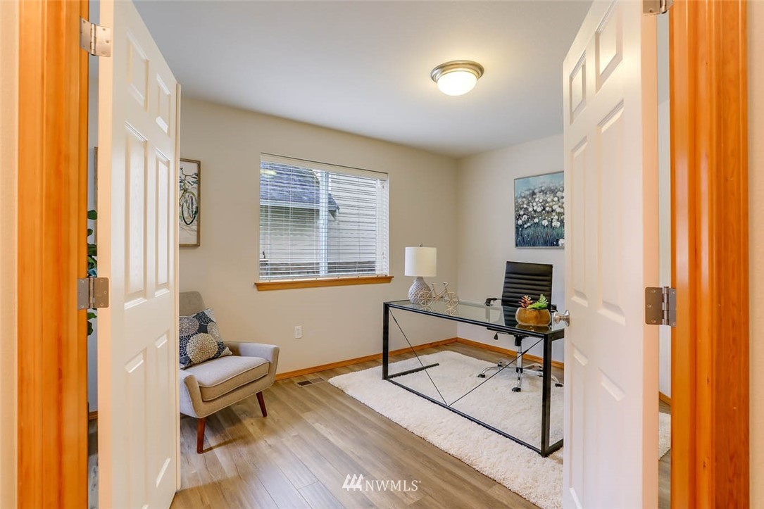 6731 Southeast 3rd Street Renton, WA 98059 - Photo 15 of 31 a view of a workspace with furniture and a window