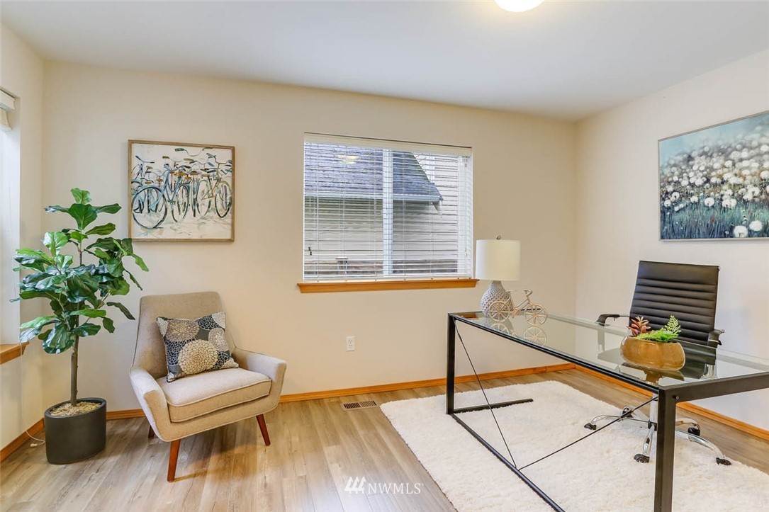 6731 Southeast 3rd Street Renton, WA 98059 - Photo 17 of 31 a living room with furniture and a window