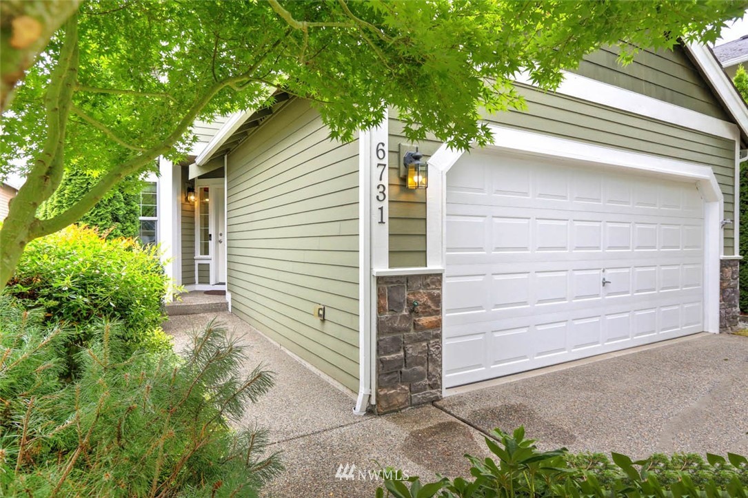 6731 Southeast 3rd Street Renton, WA 98059 - Photo 3 of 31 a yellow house with outdoor space