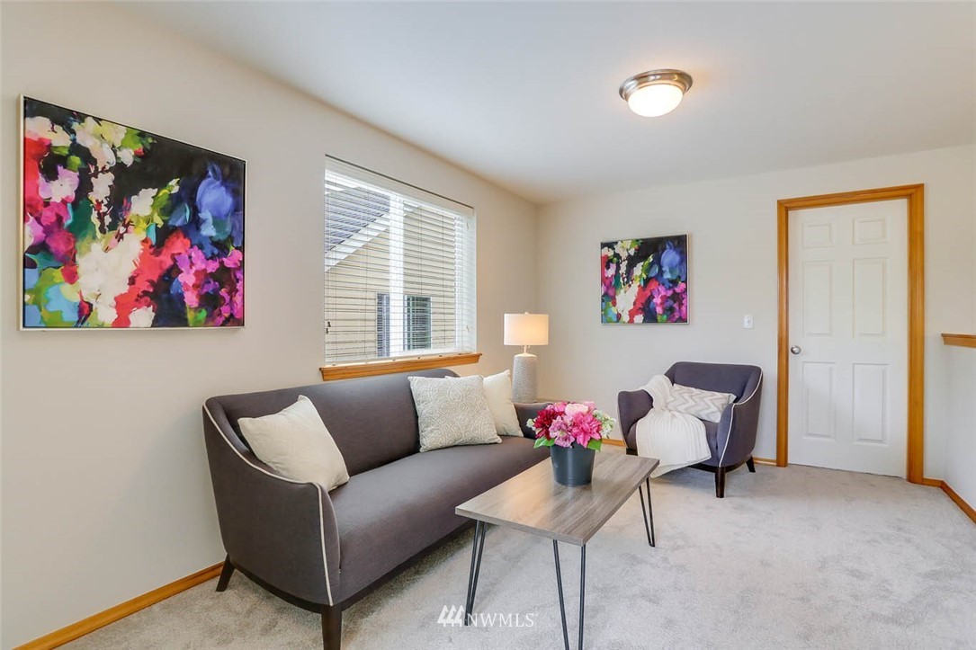 6731 Southeast 3rd Street Renton, WA 98059 - Photo 21 of 31 a living room with furniture and a window