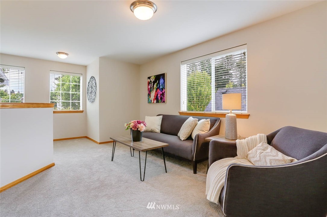 6731 Southeast 3rd Street Renton, WA 98059 - Photo 22 of 31 a living room with furniture and a window